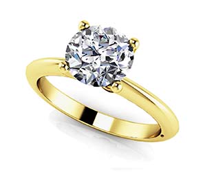 Four Prong Timeless Round Solitaire Diamond Ring 